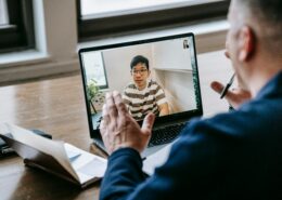 Online coaching discovery call with client and coach discussing goals over video meeting