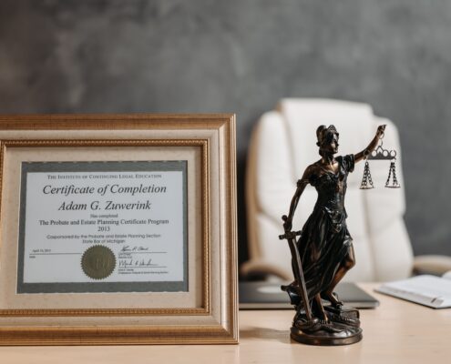 Framed life coach certification displayed in a professional office, representing coaching credentials and career development